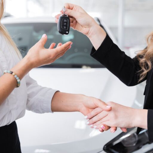 cropped-side-view-woman-receiving-car-keys.jpg